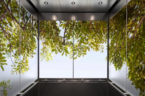 Elevator interior with panels in ViviSpectra Zoom glass with Canopy interlayer 